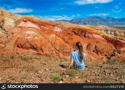 Woman in valley of Mars landscapes in the Altai Mountains, Kyzyl Chin, Siberia, Russia. Valley of Mars landscapes