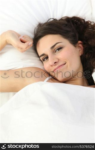 Woman in warm bed