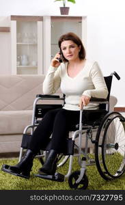 Woman in wheelchair at home 