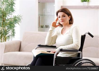 Woman in wheelchair at home 