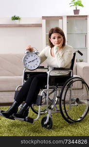 Woman in wheelchair at home 