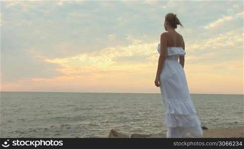 woman in white dress on the beach
