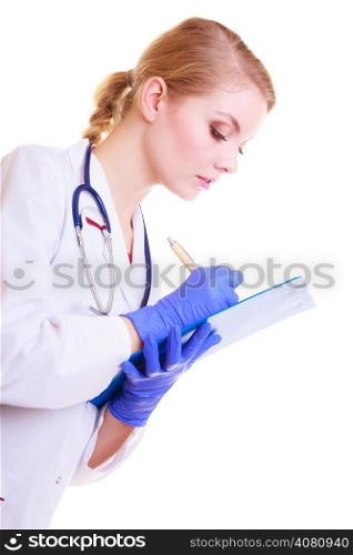 Woman in white lab coat. Doctor or nurse with stethoscope writing with pen on clipboard isolated. Medical person for health insurance.