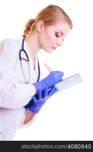 Woman in white lab coat. Doctor or nurse with stethoscope writing with pen on clipboard isolated. Medical person for health insurance.