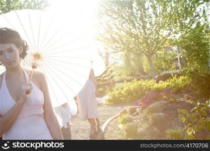 Woman in White with Paper Umbrella