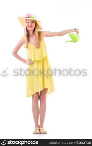 Woman in yellow dress with watering can