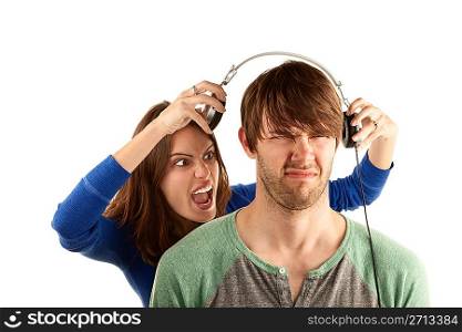 Woman interupts man with headphones