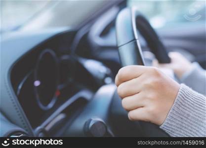 Woman is driving car