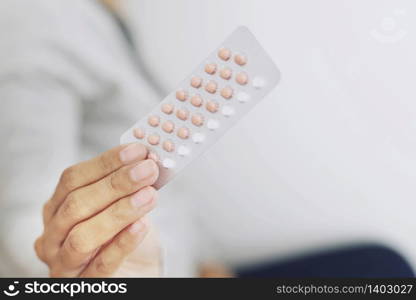 Woman is eating contraceptives before sex, prevent premature pregnancy