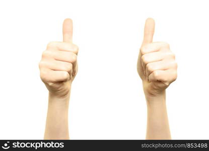 Woman is holding two thumbs up into the air on a white background