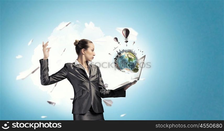 Woman IT manager. Young businesswoman with laptop presenting social net concept. Elements of this image are furnished by NASA