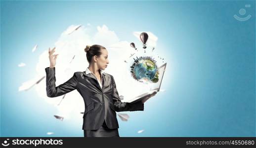 Woman IT manager. Young businesswoman with laptop presenting social net concept. Elements of this image are furnished by NASA