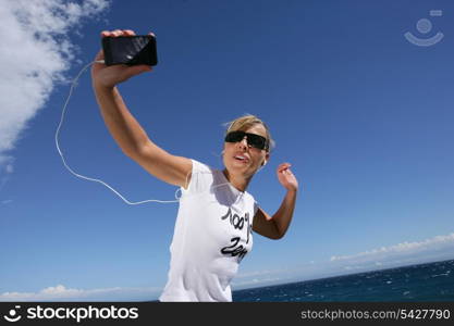 Woman jogging by the coast