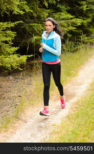 Woman jogging outdoor running on countryside path