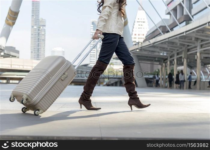 Woman journey with luxury luggage in the airport. Travel Concept.