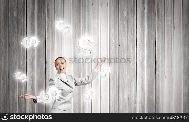 Woman juggler. Young pretty businesswoman juggling with dollar symbols