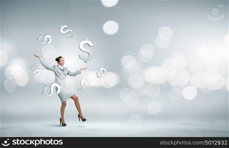 Woman juggler. Young pretty businesswoman juggling with dollar symbols