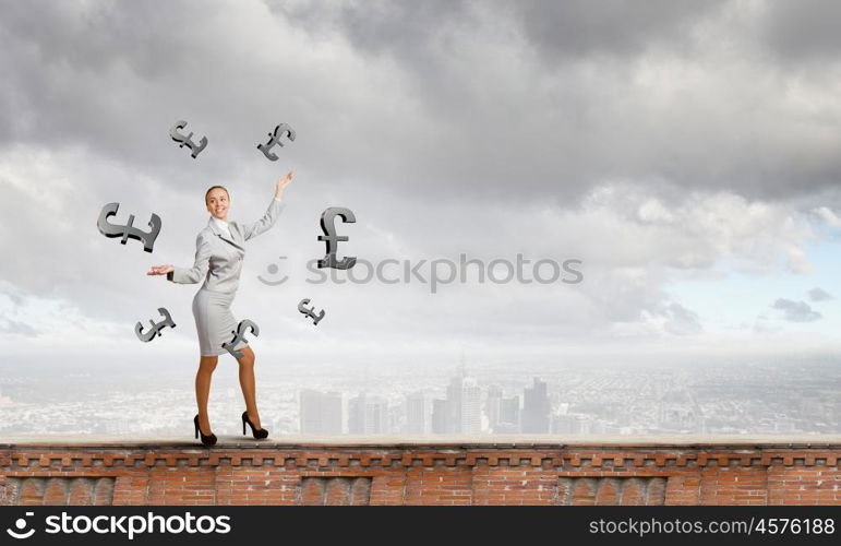 Woman juggler. Young pretty businesswoman juggling with pound symbols