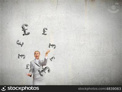 Woman juggler. Young pretty businesswoman juggling with pound symbols