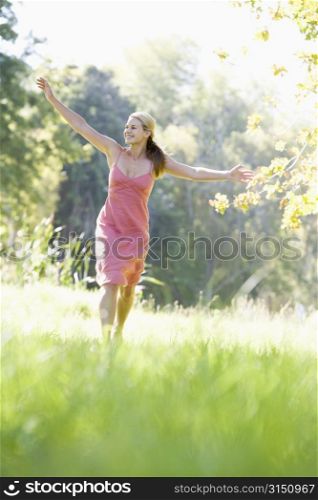 Woman jumping in a park