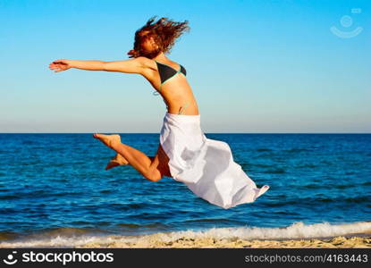 Woman jumping in the air