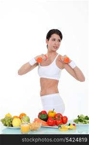 Woman keeping fit and eating healthily