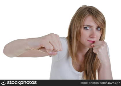 woman kickboxer trying to hit using right hook punch, isolated over white, focus on fist