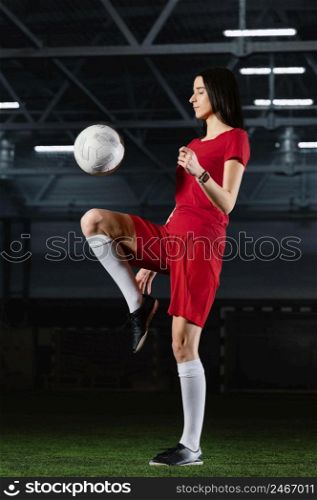 woman kicking football ball 2