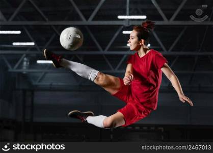 woman kicking football ball 4