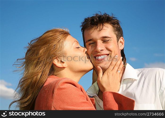 woman kisses the man