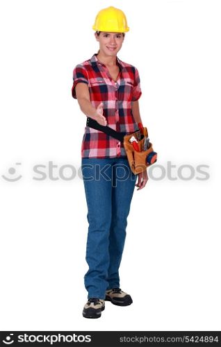 Woman laborer stretching her hand for greeting