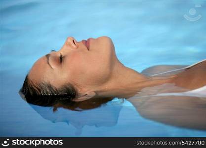 Woman laid in water