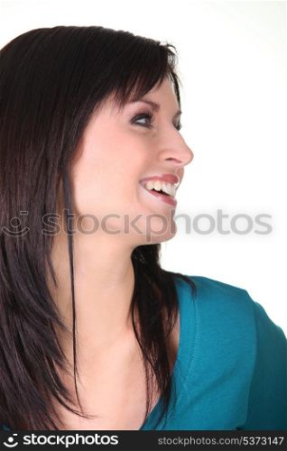 Woman laughing, profile view