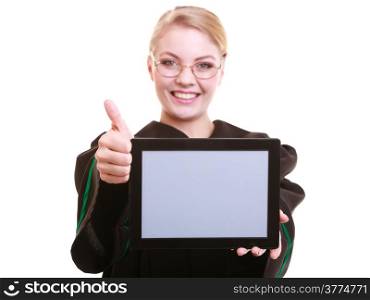 Woman lawyer attorney in classic polish gown holds tablet blank copy space shows thumb up. Technology.
