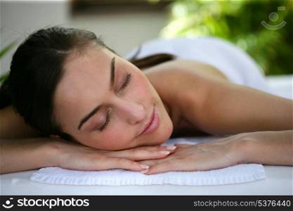 Woman laying down at health spa