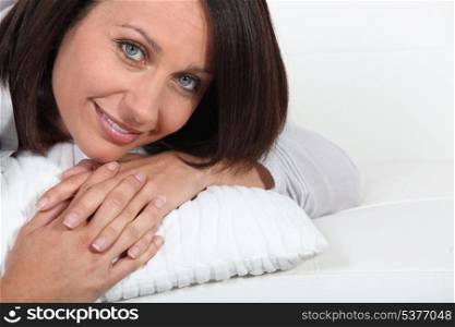 Woman laying on pillow