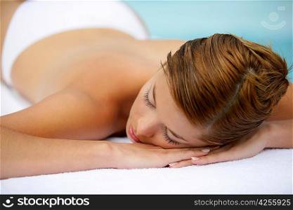 Woman laying on table waiting for massage