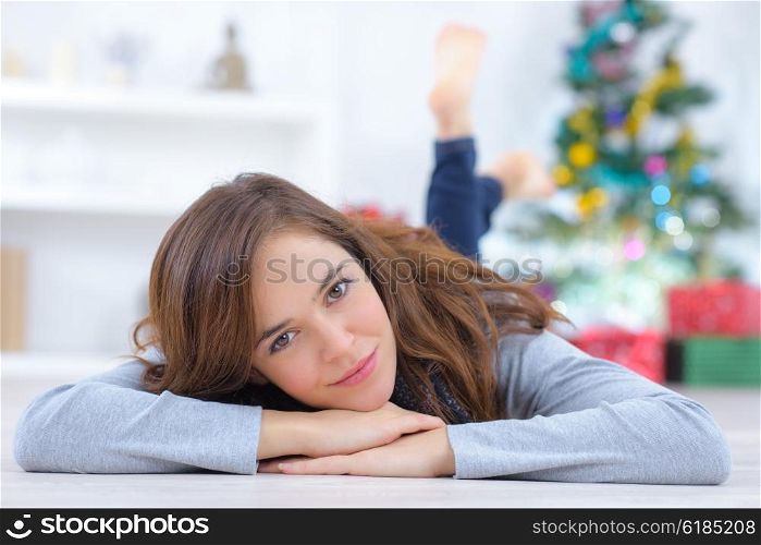Woman laying on the floor at home