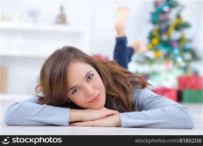 Woman laying on the floor at home