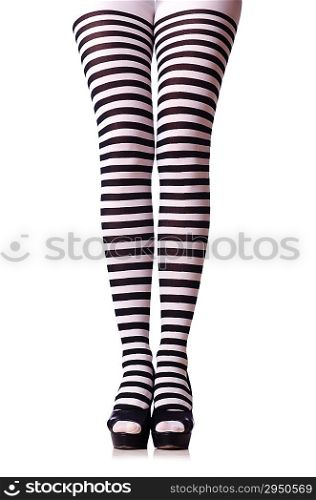 Woman legs in black and white stockings