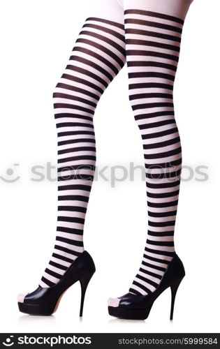 Woman legs in black and white stockings