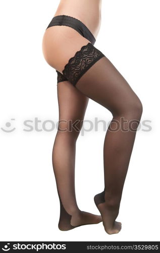 woman legs in stockings. Isolated on white.