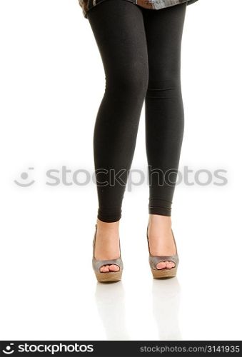 Woman legs isolated over white.