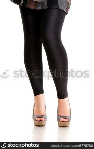 Woman legs isolated over white.