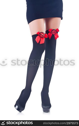 Woman legs with stockings on white