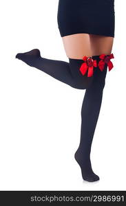 Woman legs with stockings on white