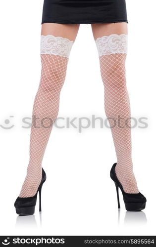 Woman legs with stockings on white