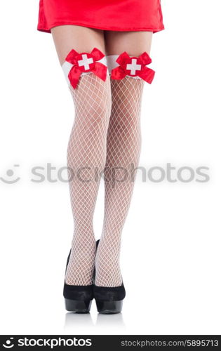 Woman legs with stockings on white