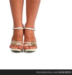 Woman legs with white high heel shoes over white