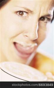 Woman Licking Milk From Her Lip